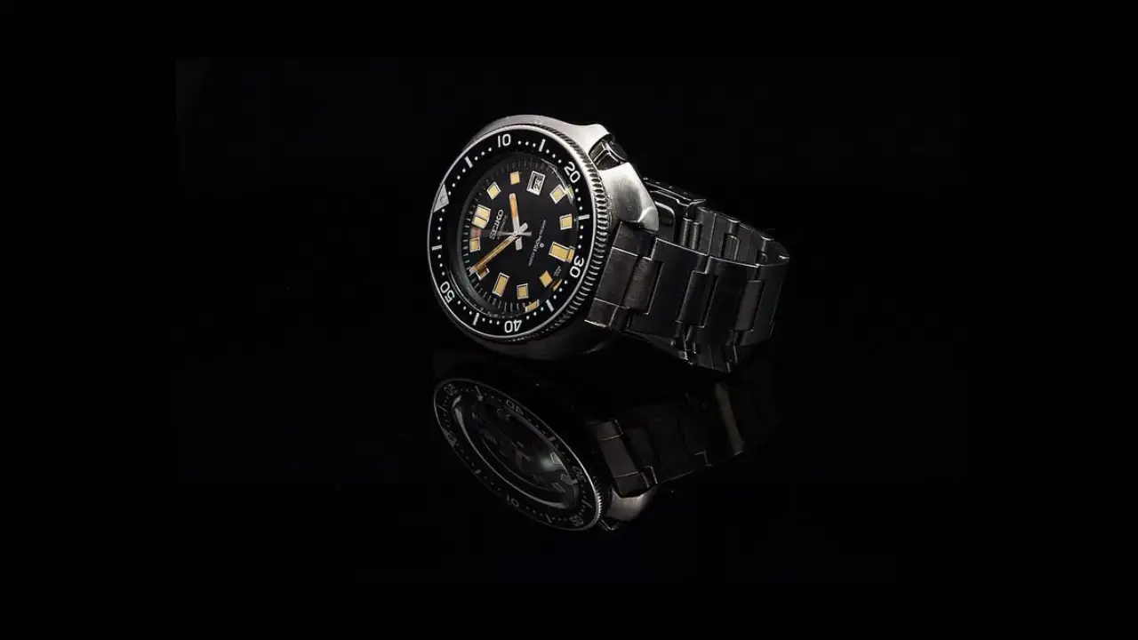 Detailed close-up of the Seiko 6105 vintage diver watch, an iconic Seiko dive model known for its durability and classic design, featured in a comprehensive review.